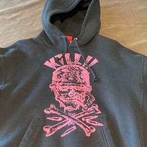 Woman’s large Psycho Wheels black pullover hoodie.